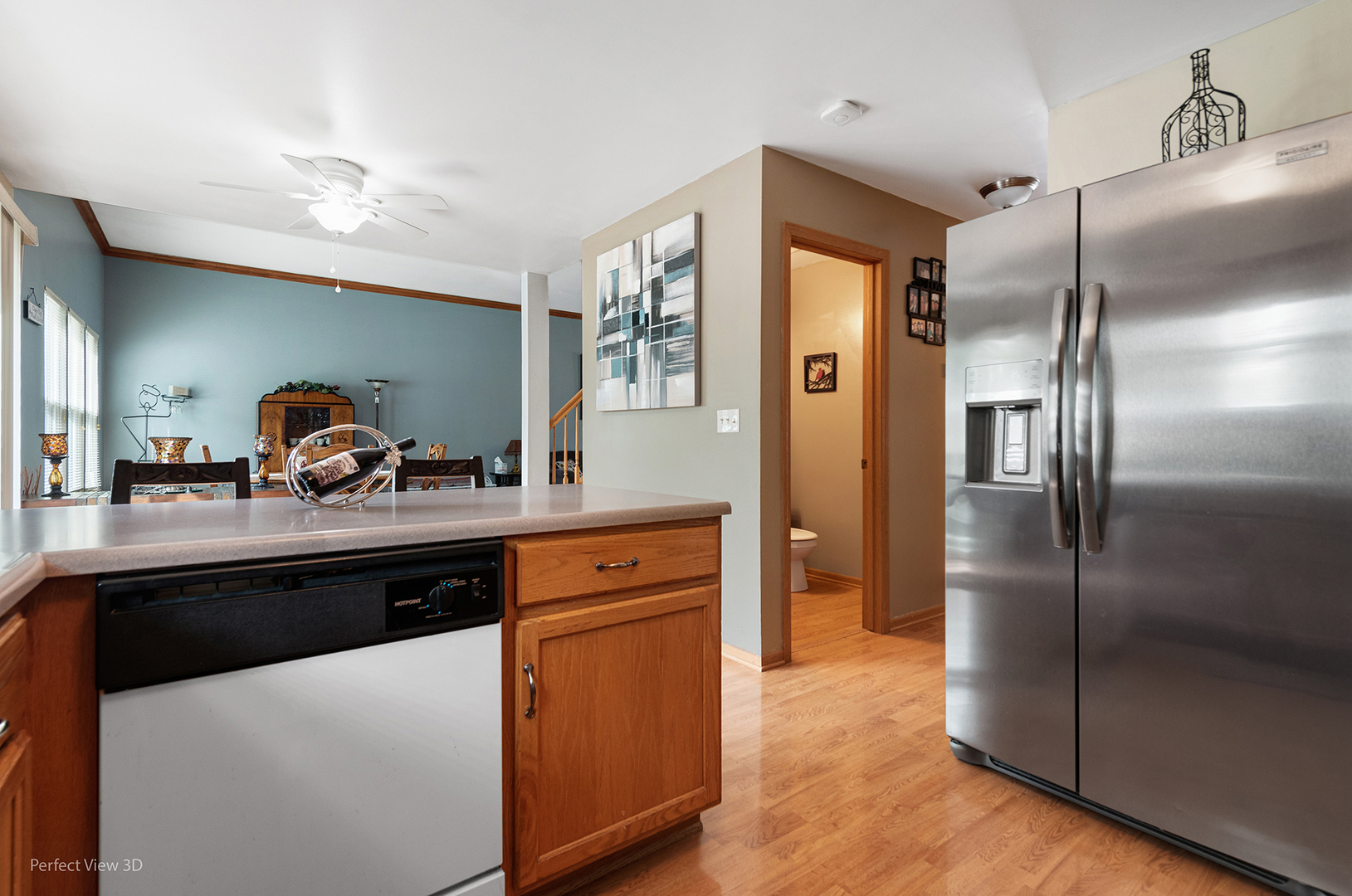 5802 Emerald Pointe Drive Plainfield, IL 60586 - Photo 8 of 28 a kitchen with stainless steel appliances granite countertop a refrigerator and a sink