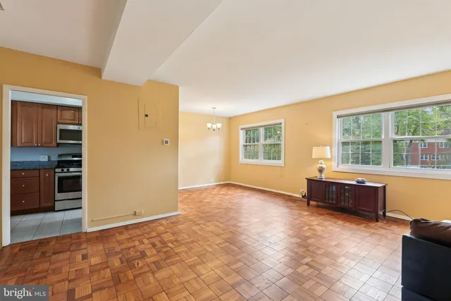a view of an empty room with a window