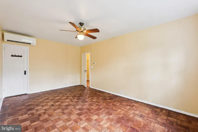 a view of a big room with wooden floor