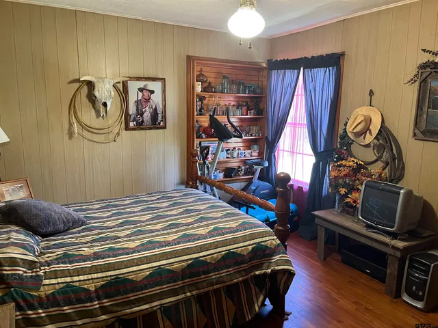 a bedroom with a bed and a closet