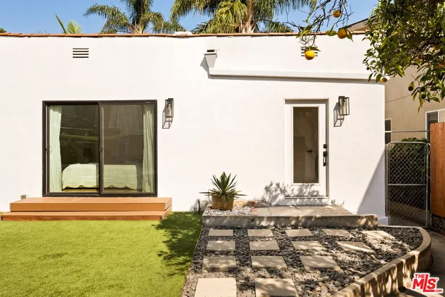 a black and white photo of a fireplace