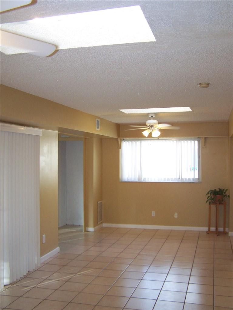 22295 Southwest 57th Avenue Boca Raton, FL 33428 - Photo 12 of 35 DINING ROOM WITH 2 SKYLIGHTS