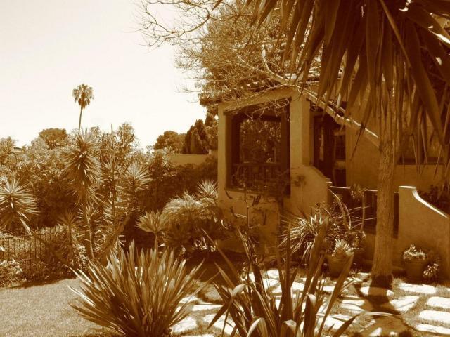 1423 Alta Vista Road Santa Barbara, CA 93103 - Photo 17 of 17 a backyard of a house with lots of green space
