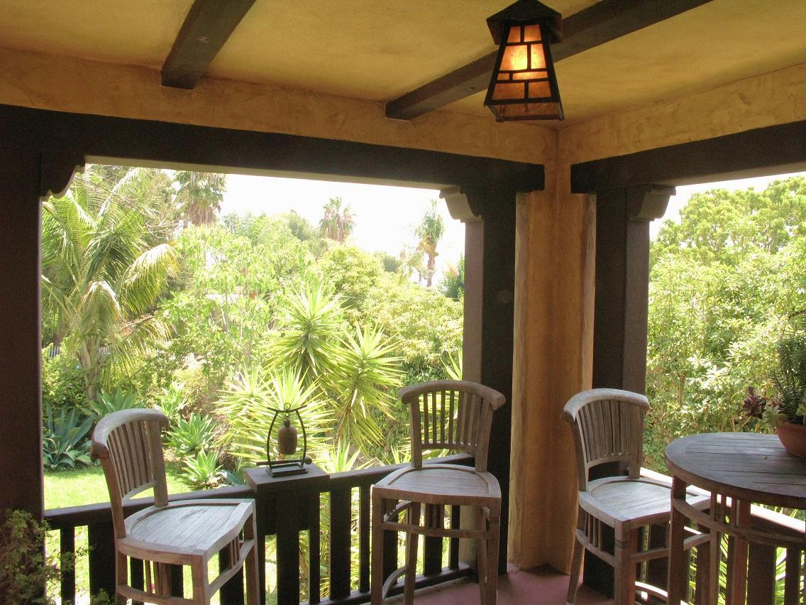 1423 Alta Vista Road Santa Barbara, CA 93103 - Photo 2 of 17 a balcony view with a chairs and table in a patio
