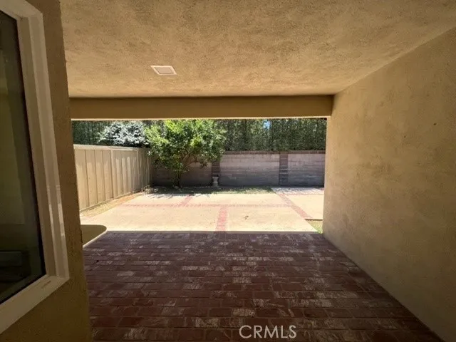 a view of backyard with green space