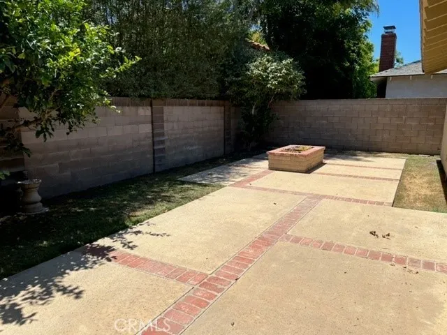 a view of backyard and tree