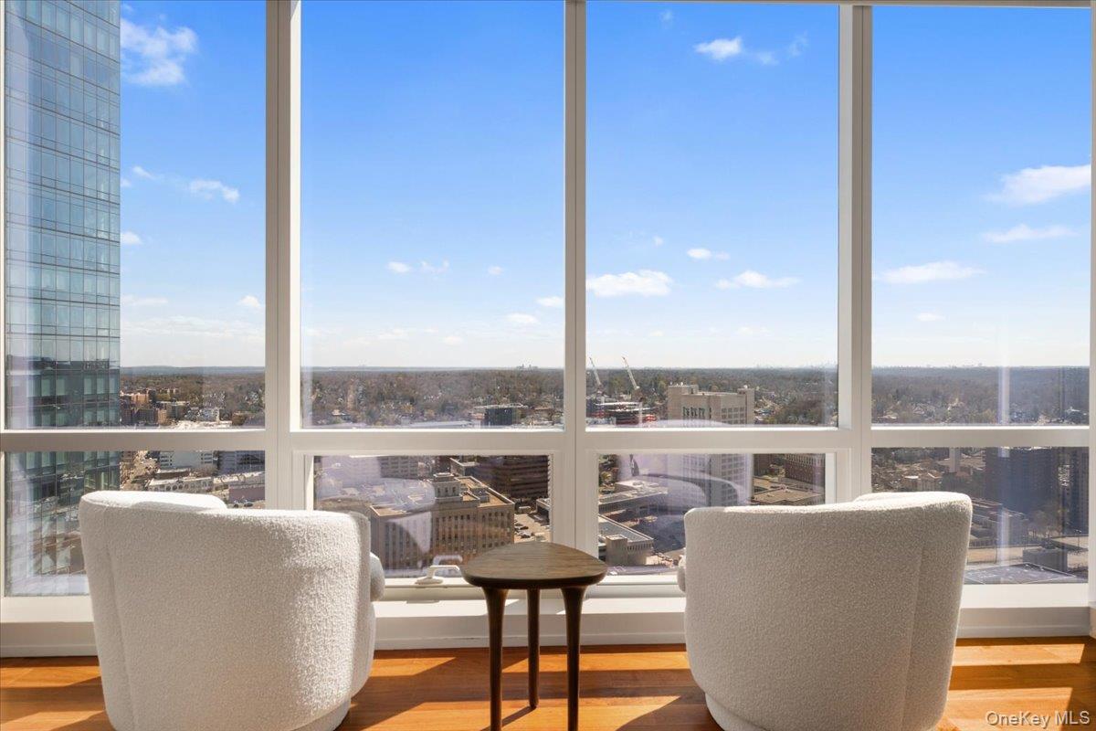 5 Renaissance Square, Unit PH 3E White Plains, NY 10601 - Photo 18 of 26 a view of roof deck with seating space and city view