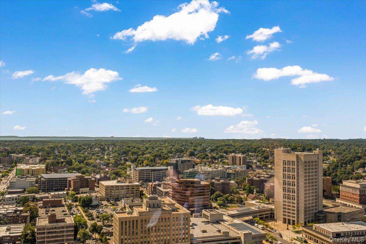 5 Renaissance Square, Unit PH 3E White Plains, NY 10601 - Photo 24 of 26 a view of a city with lots of residential buildings and ocean view