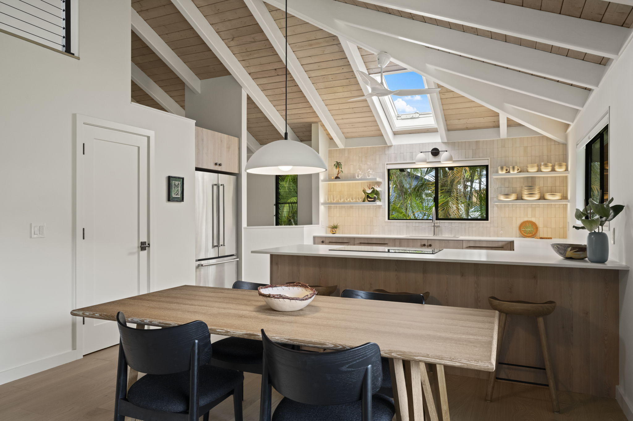 4485 Pilikoa Street Hanalei, HI 96714 - Photo 13 of 28 a kitchen with a table and chairs in it