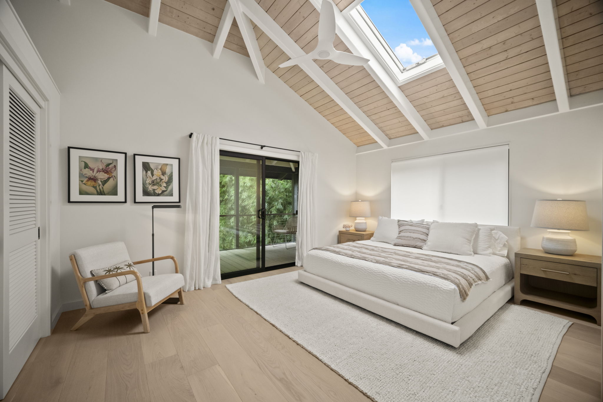 4485 Pilikoa Street Hanalei, HI 96714 - Photo 16 of 28 a bedroom with a large bed and a window