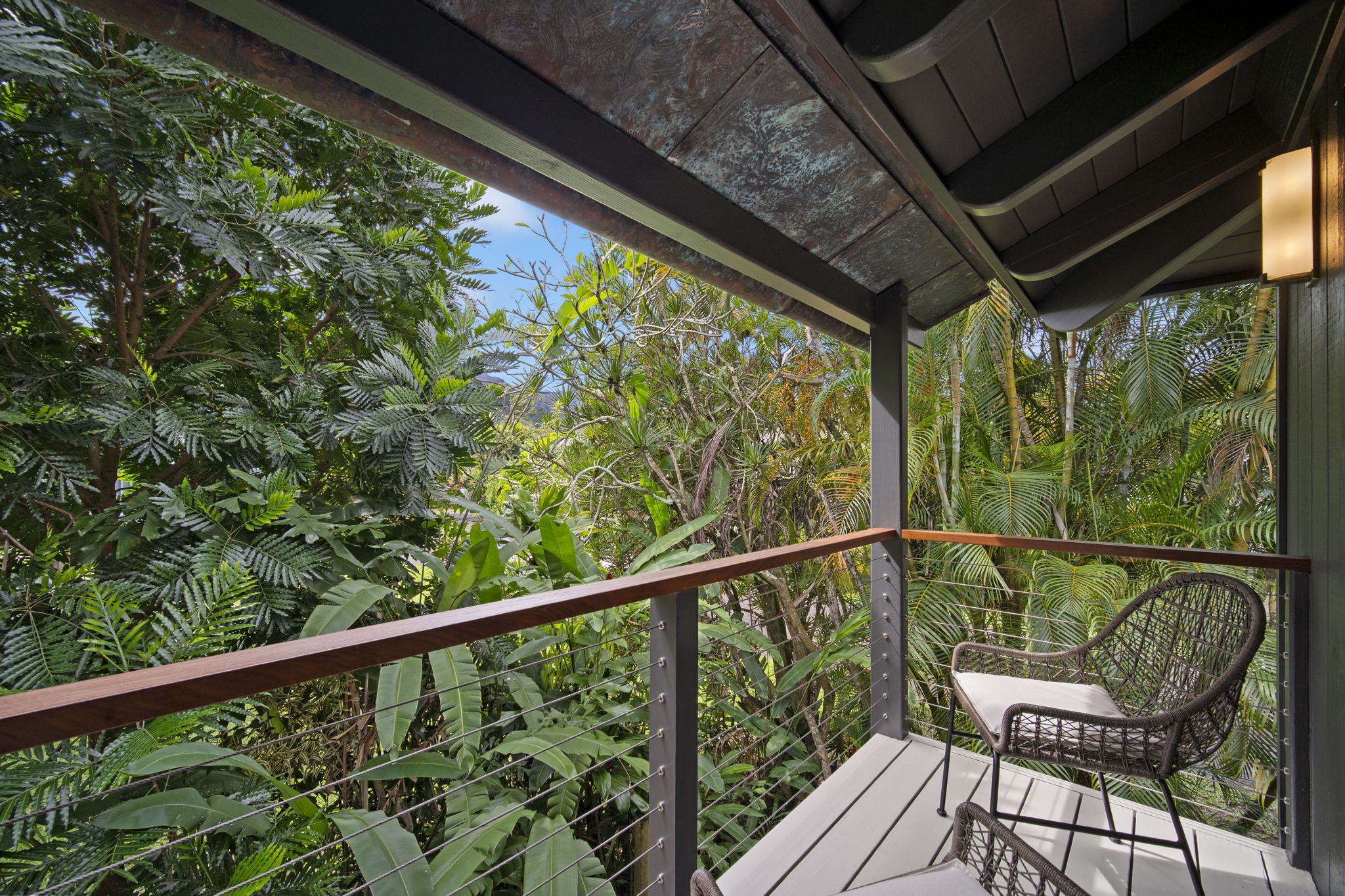 4485 Pilikoa Street Hanalei, HI 96714 - Photo 20 of 28 a view of a chair and table in balcony