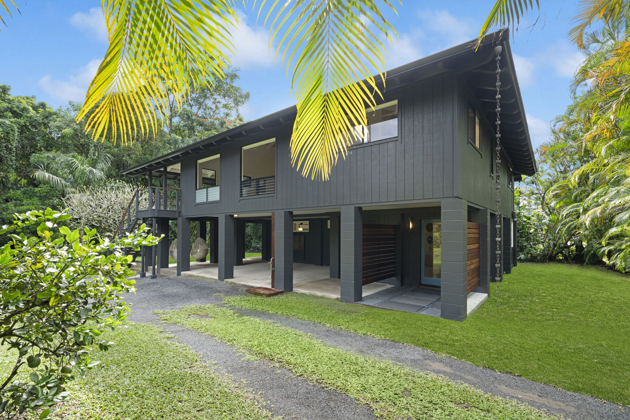 4485 Pilikoa Street Hanalei, HI 96714 - Photo 24 of 28 a view of a house with a yard