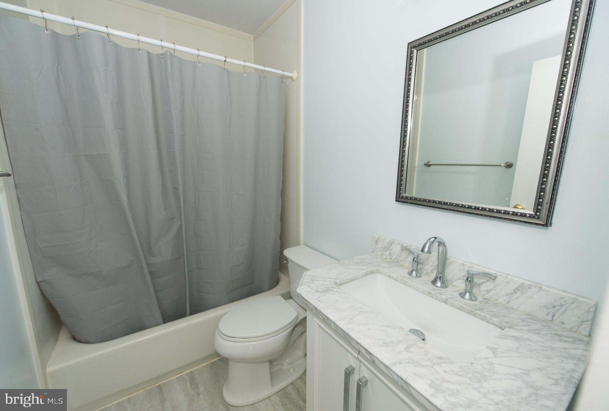 2358 Soft Wind Court Reston, VA 20191 - Photo 19 of 34 Updated hall bath