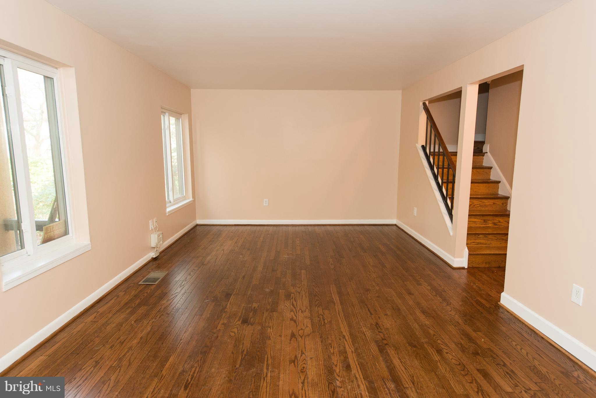 2358 Soft Wind Court Reston, VA 20191 - Photo 9 of 34 HUGE living room with refinished hdwd flooring