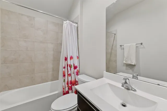 a bathroom with a sink and toilet