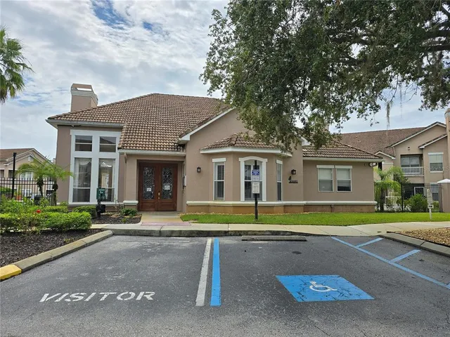 a swimming pool with outdoor seating and yard
