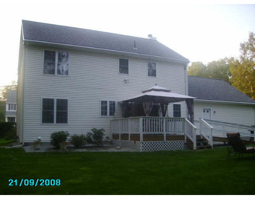 84 Colburn Road Charlton, MA 01507 - Photo 4 of 22 a front view of a house with a garden