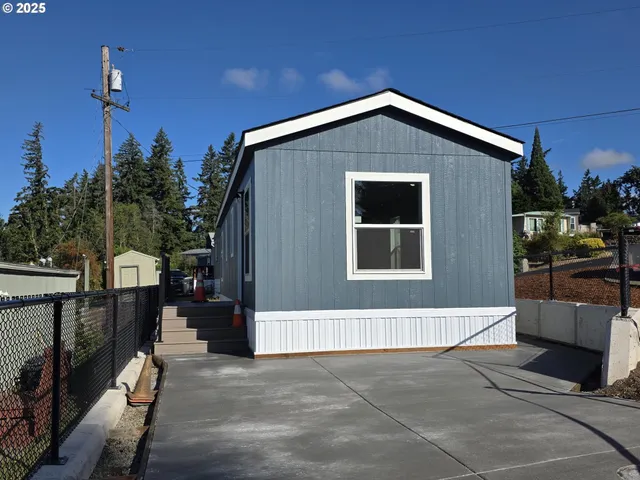 a front view of a house with a garage