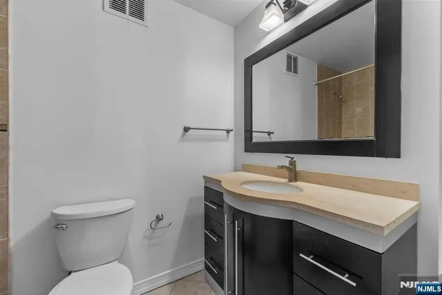 a bathroom with a sink and a toilet