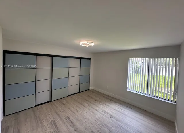 a view of a room with windows