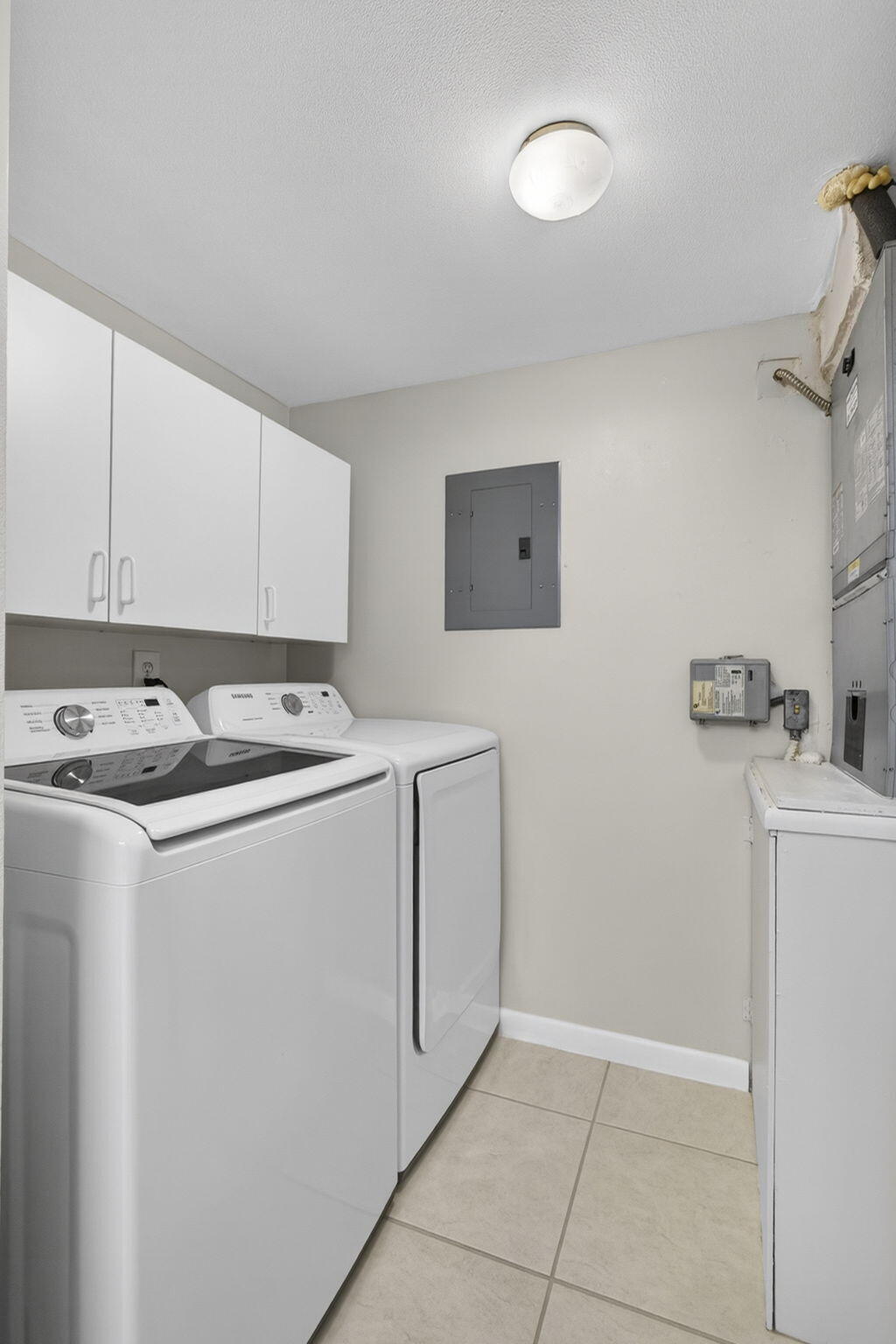 301 Pine Ridge Circle, Unit B2 Greenacres, FL 33463 - Photo 12 of 31 Laundry
