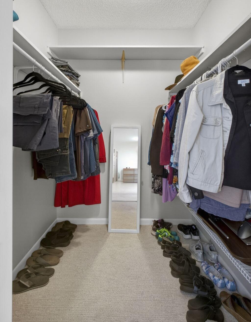 301 Pine Ridge Circle, Unit B2 Greenacres, FL 33463 - Photo 16 of 31 Primary Closet