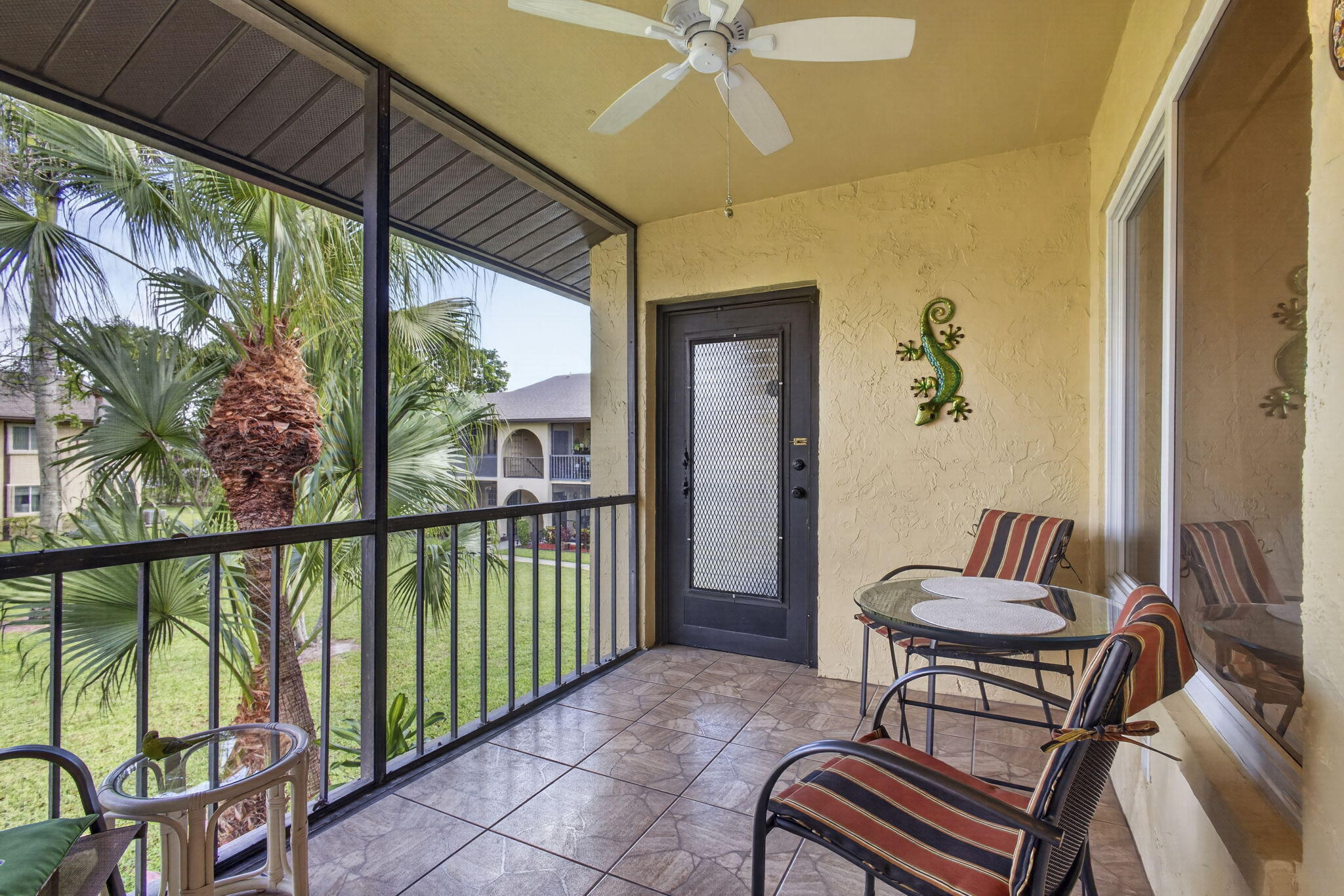 301 Pine Ridge Circle, Unit B2 Greenacres, FL 33463 - Photo 3 of 31 Screened Lanai