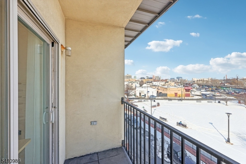 15 Tichenor Street, Unit 407 Newark, NJ 07114 - Photo 25 of 25 a view of a balcony with city view
