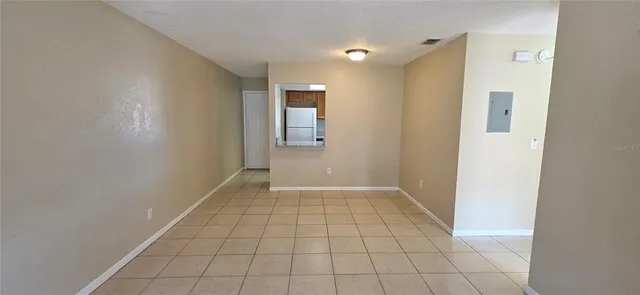 a view of an empty room and window