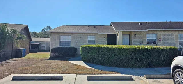 a view of backyard with seating space
