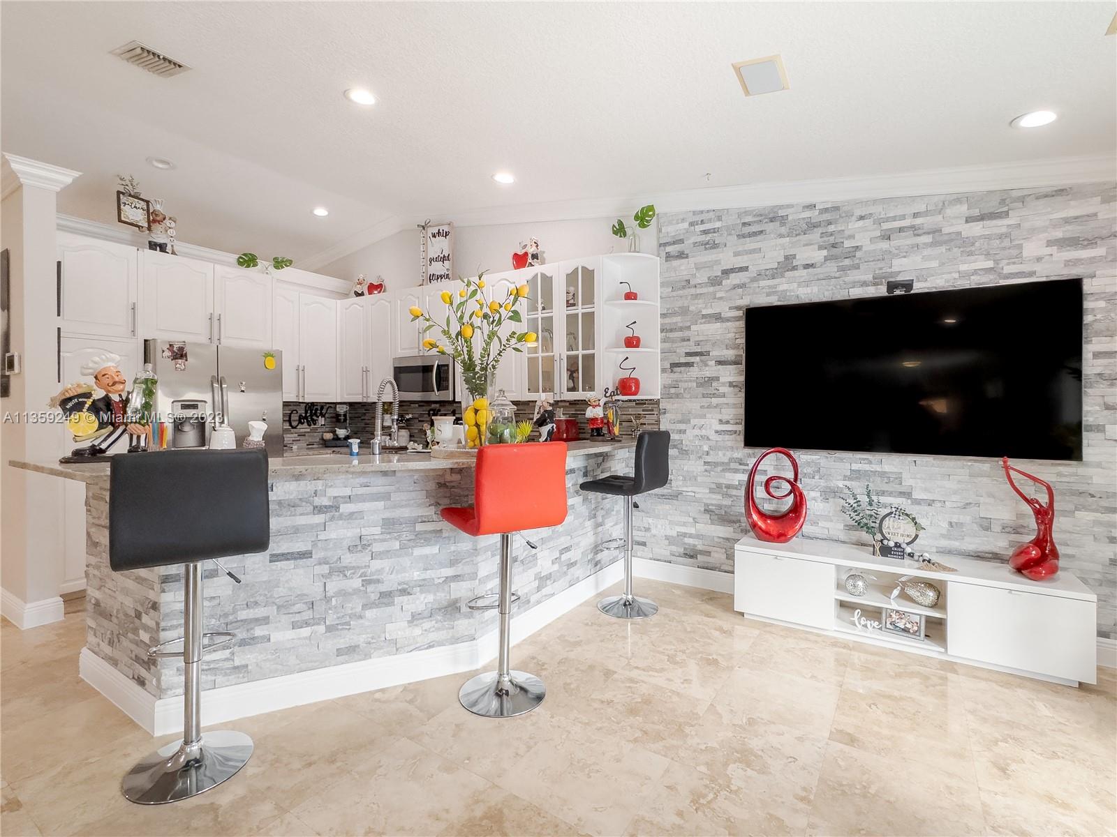 Kendale Lakes Miami, FL 33175 - Photo 13 of 39 a living room with furniture and a flat screen tv