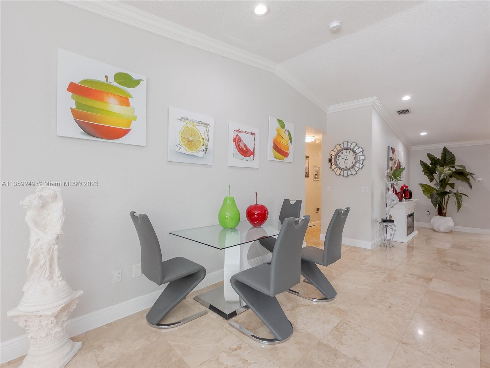 Kendale Lakes Miami, FL 33175 - Photo 14 of 39 a view of a dining room with furniture