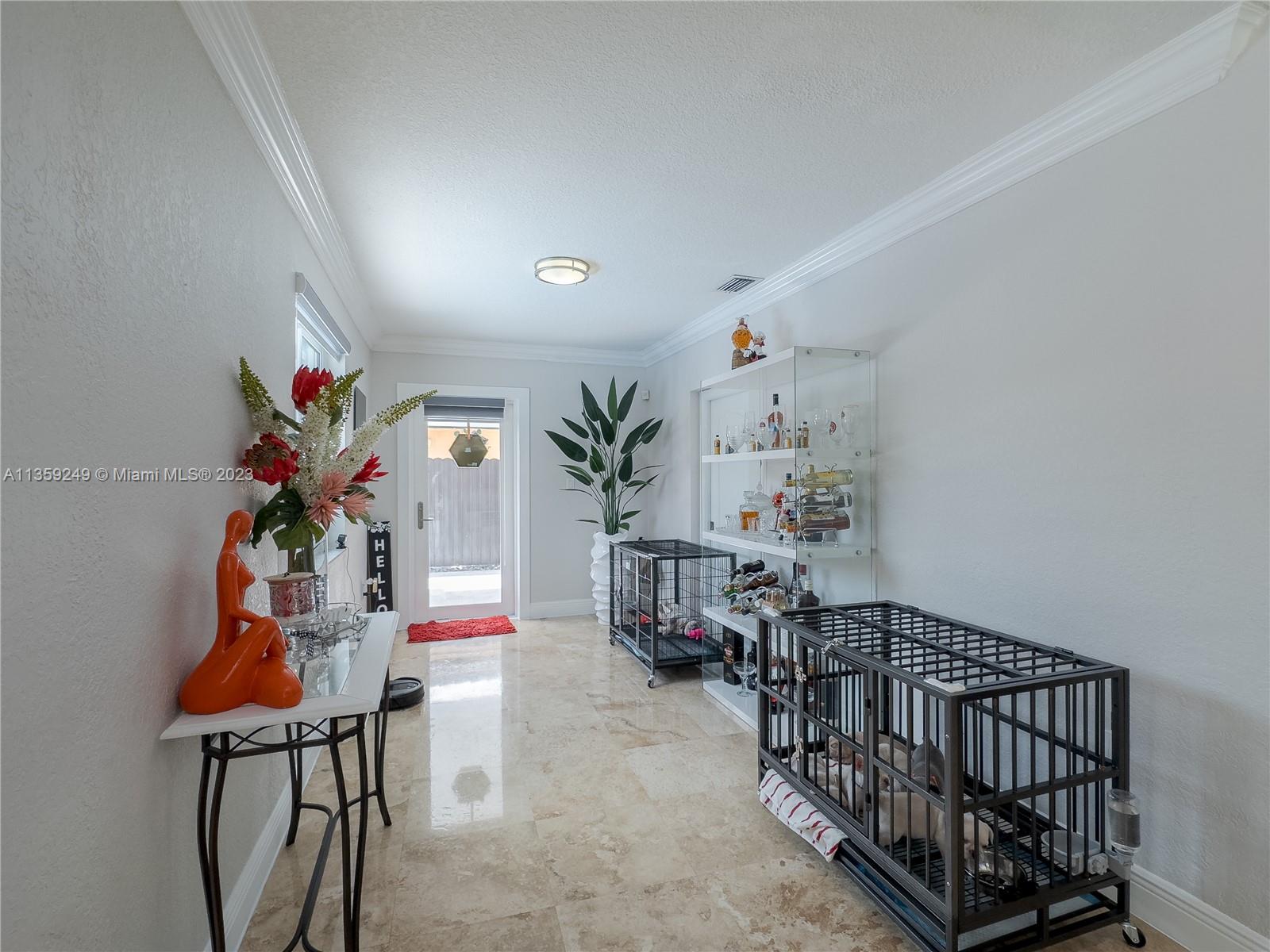 Kendale Lakes Miami, FL 33175 - Photo 26 of 39 a view of entryway with wooden floor