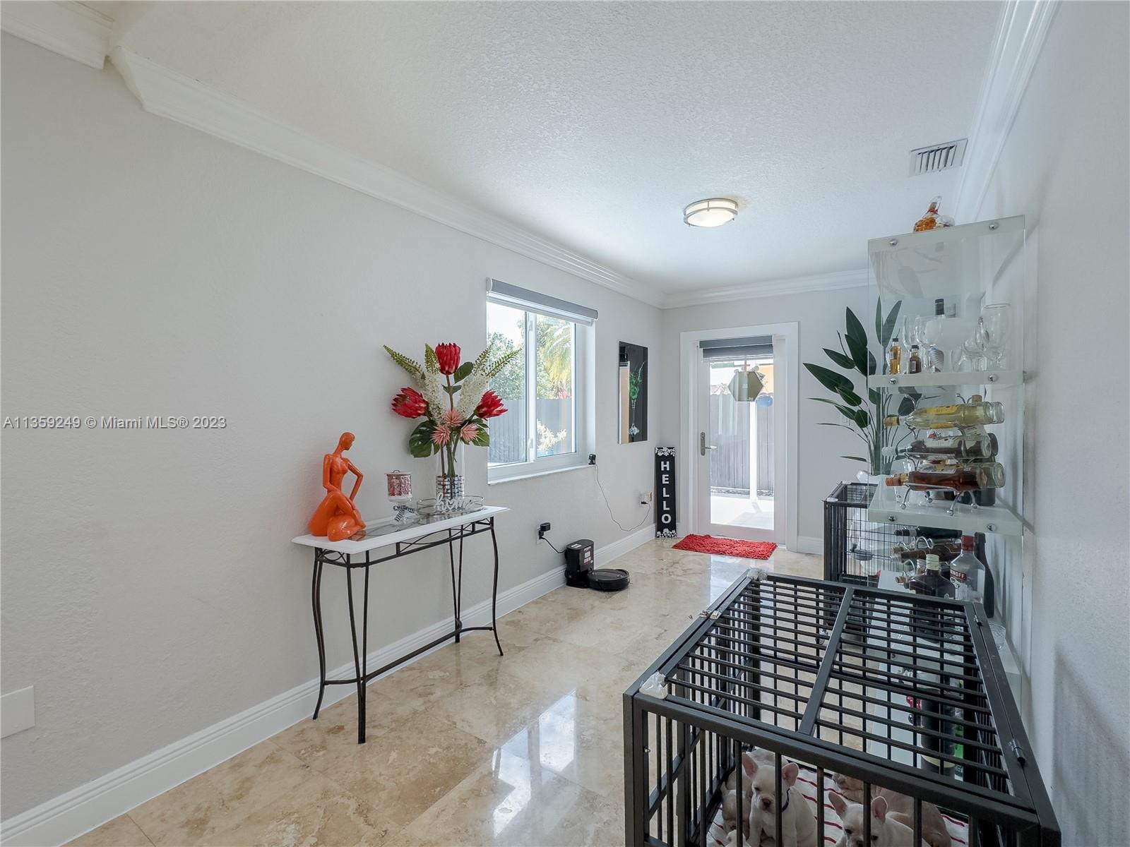 Kendale Lakes Miami, FL 33175 - Photo 27 of 39 a bedroom with furniture and wooden floor
