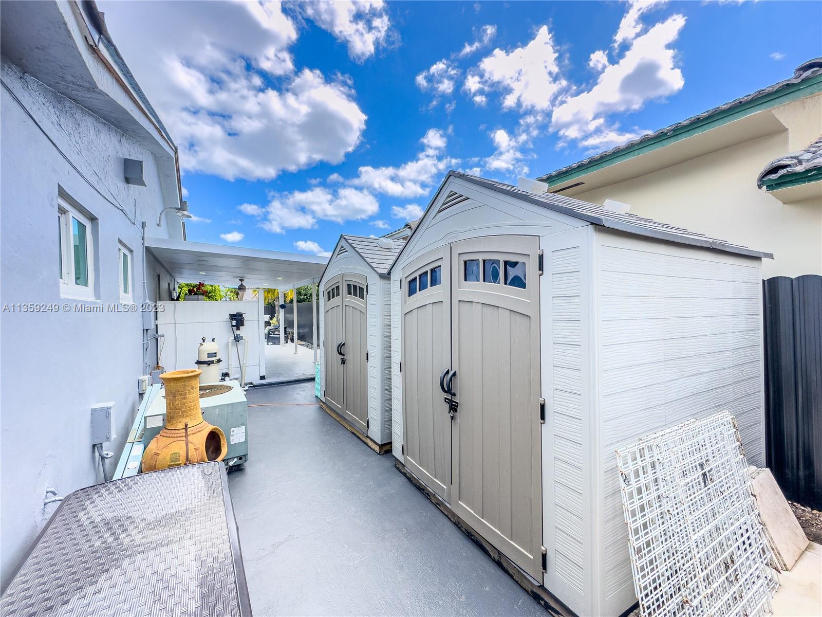 Kendale Lakes Miami, FL 33175 - Photo 35 of 39 a view of living room with furniture and a chandelier