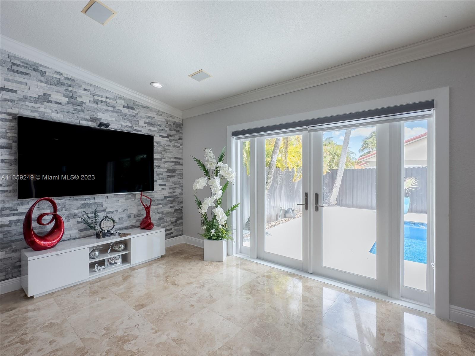 Kendale Lakes Miami, FL 33175 - Photo 5 of 39 a view of livingroom with furniture and flat screen tv