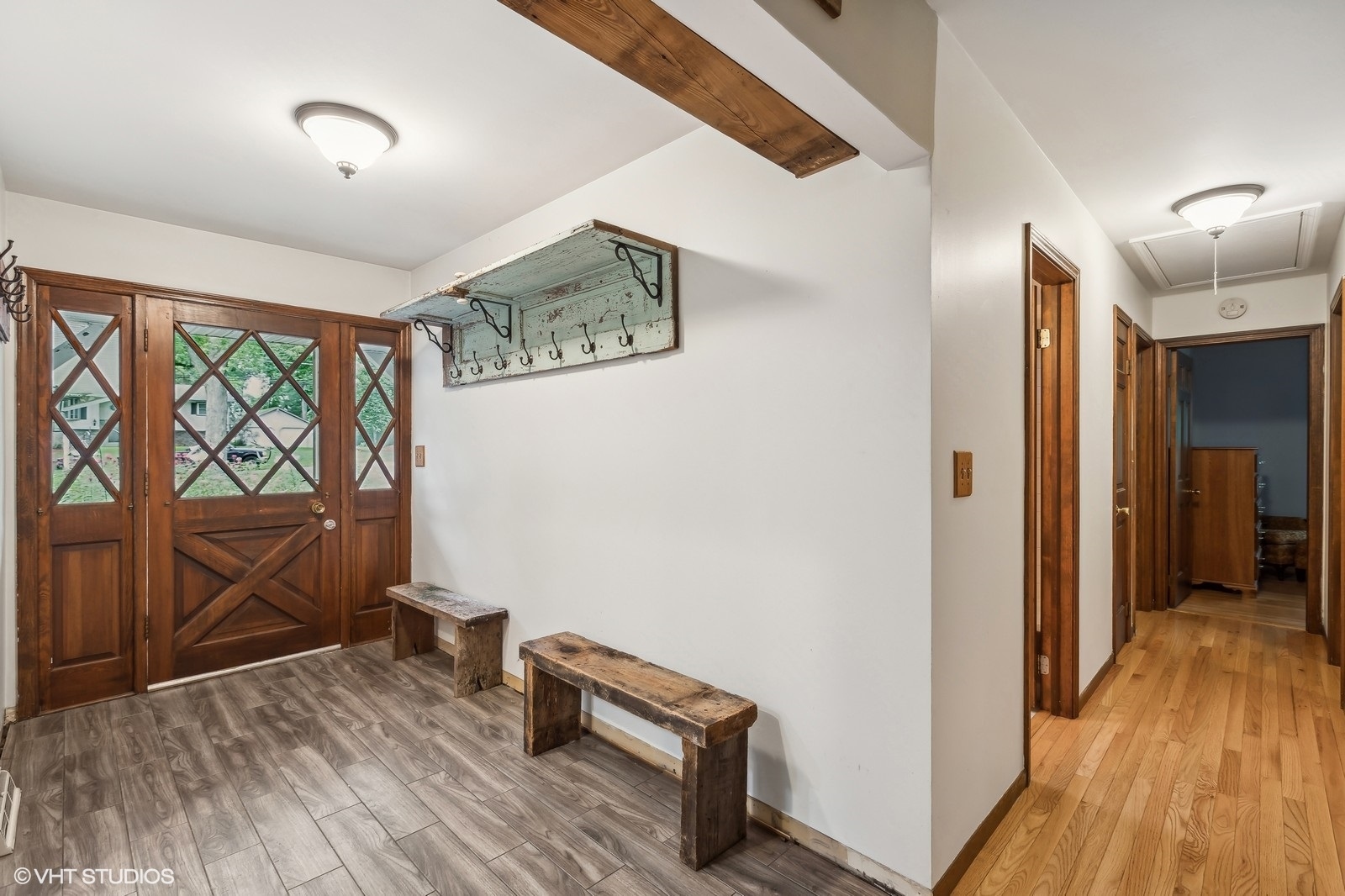 713 Hickory Road Woodstock, IL 60098 - Photo 2 of 13 a view of room with wooden floor