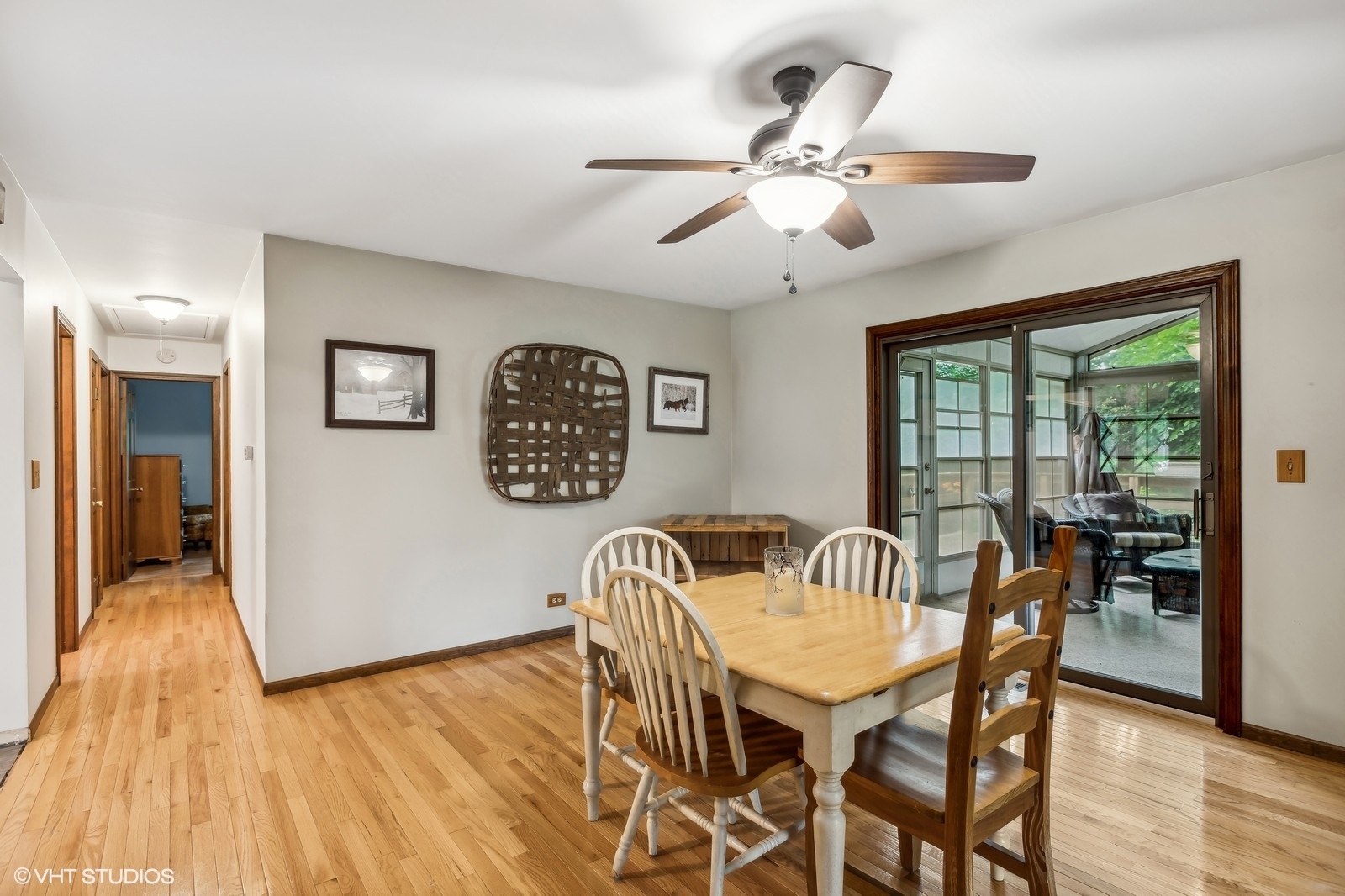 713 Hickory Road Woodstock, IL 60098 - Photo 3 of 13 a view of a dining room with furniture window and wooden floor