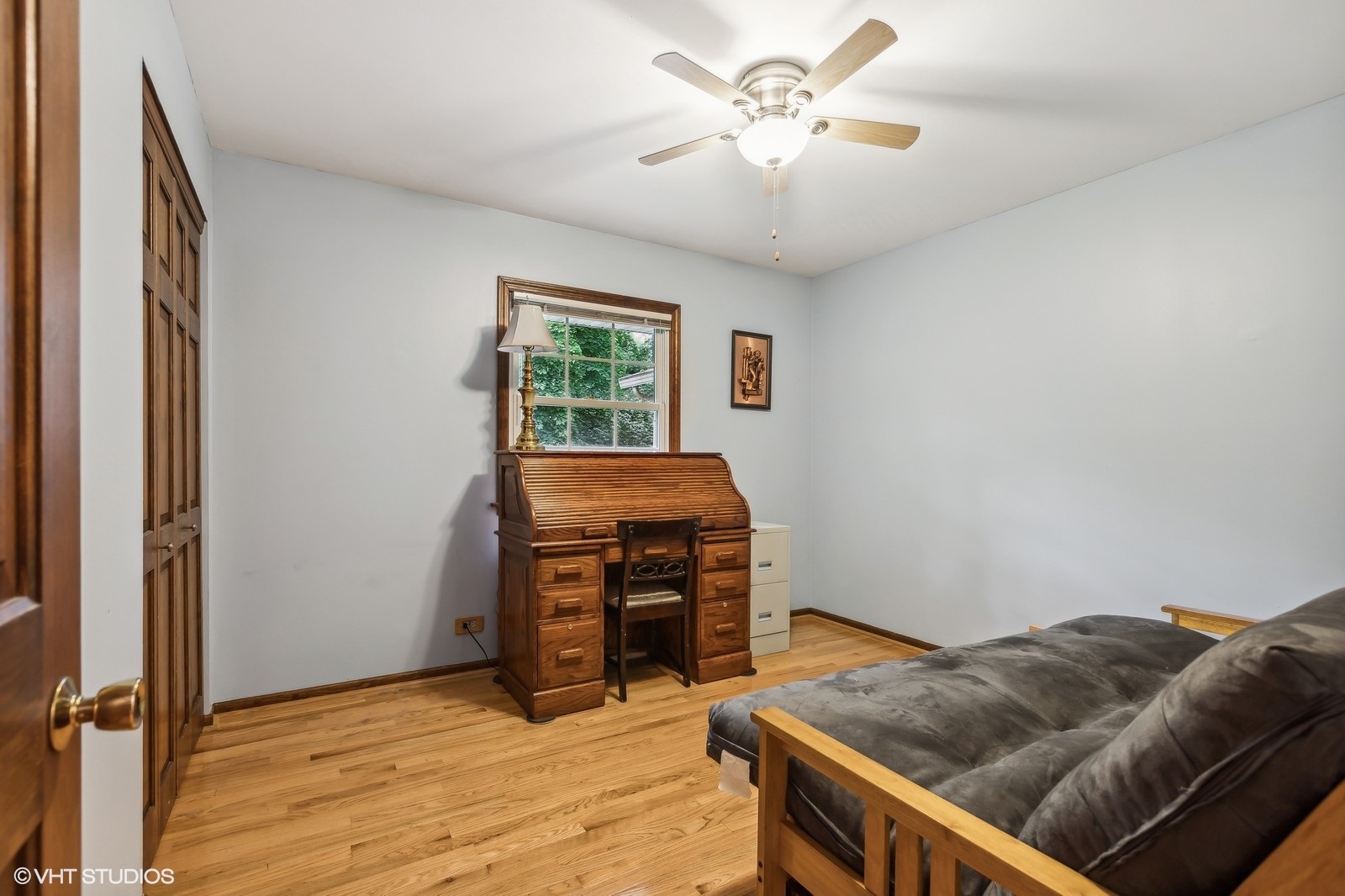 713 Hickory Road Woodstock, IL 60098 - Photo 8 of 13 a living room with furniture and a flat screen tv