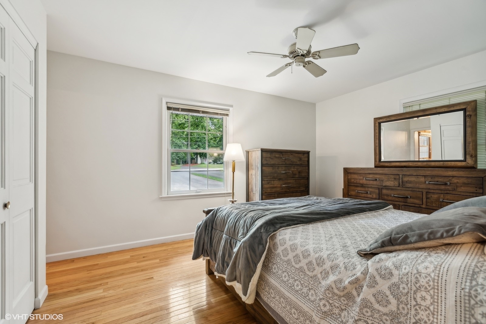 713 Hickory Road Woodstock, IL 60098 - Photo 10 of 13 a bedroom with a bed and window