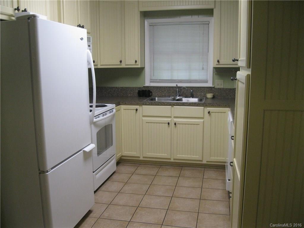 904 Fieldstone Road Mooresville, NC 28115 - Photo 2 of 15 a white refrigerator freezer sitting inside of a kitchen