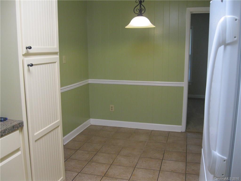 904 Fieldstone Road Mooresville, NC 28115 - Photo 3 of 15 a view of storage and utility room with a fireplace