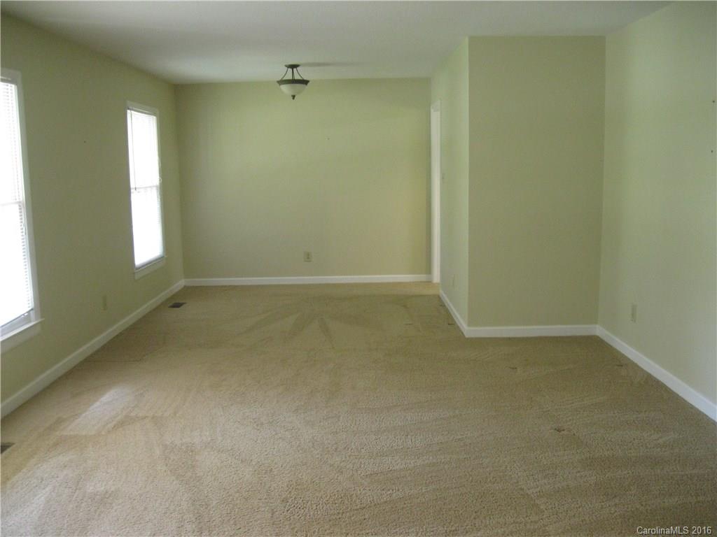 904 Fieldstone Road Mooresville, NC 28115 - Photo 7 of 15 an empty room with windows