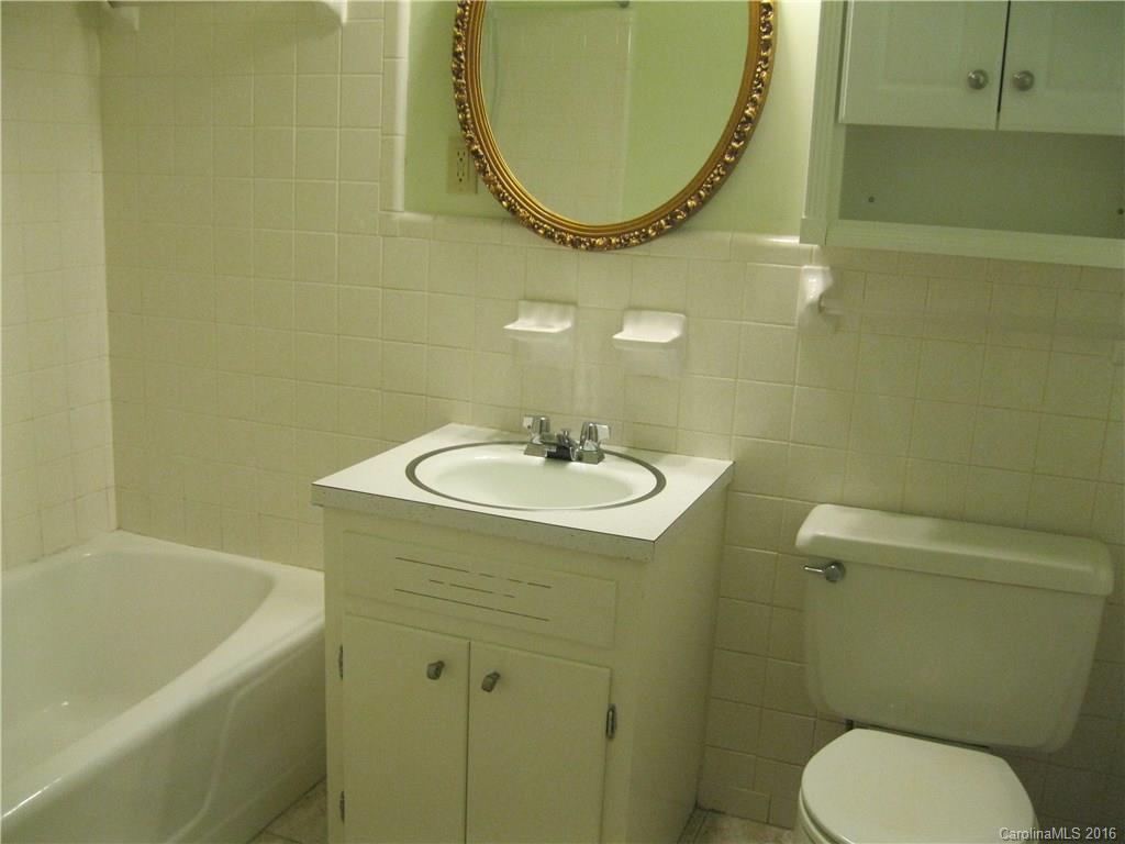 904 Fieldstone Road Mooresville, NC 28115 - Photo 8 of 15 a bathroom with a sink a toilet and a bathtub