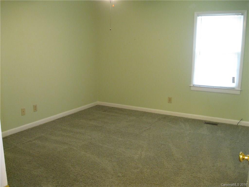 904 Fieldstone Road Mooresville, NC 28115 - Photo 9 of 15 an empty room with a window