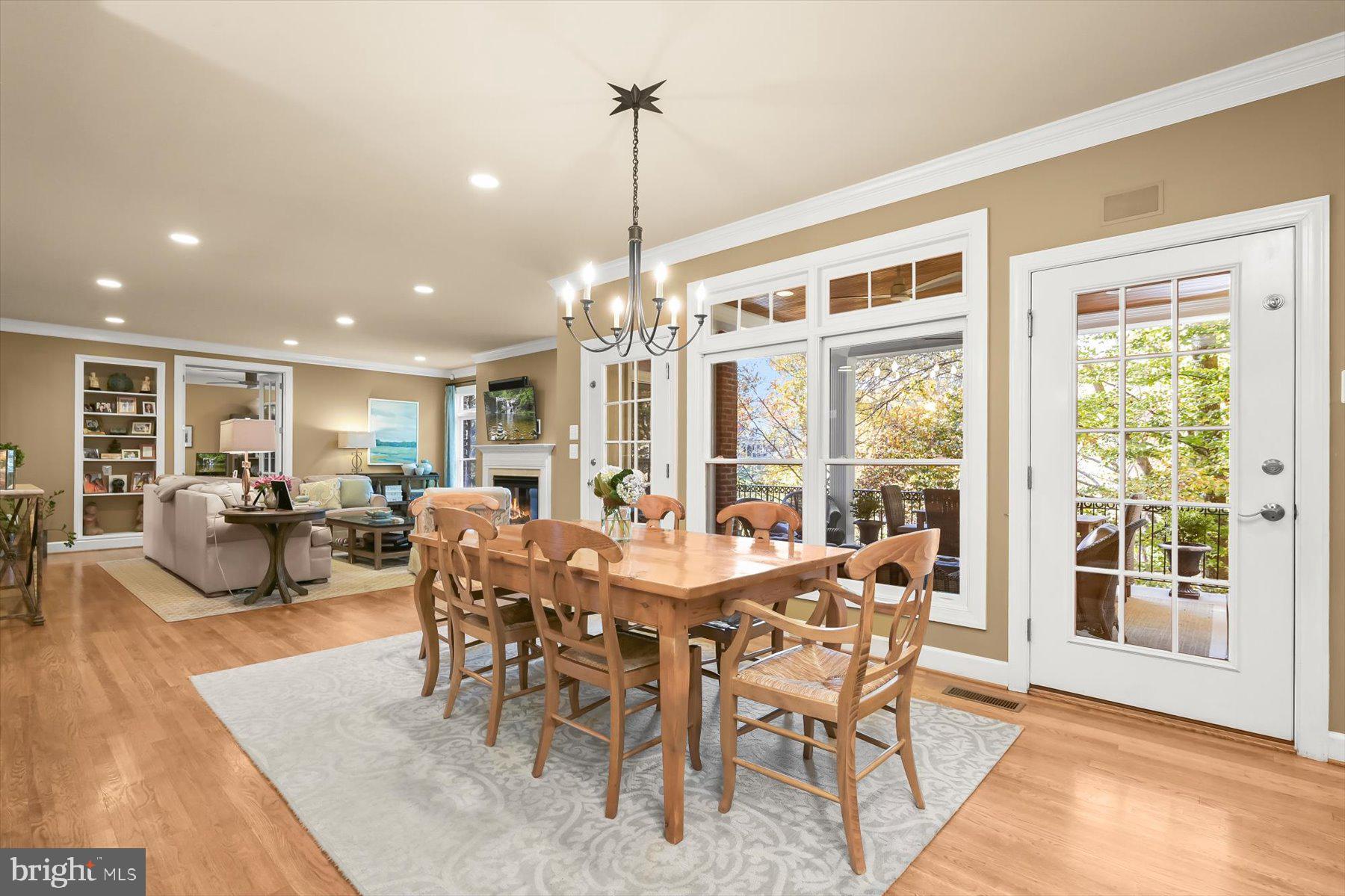 7828 Stable Way Potomac, MD 20854 - Photo 18 of 60 a view of a dining room with furniture window and wooden floor