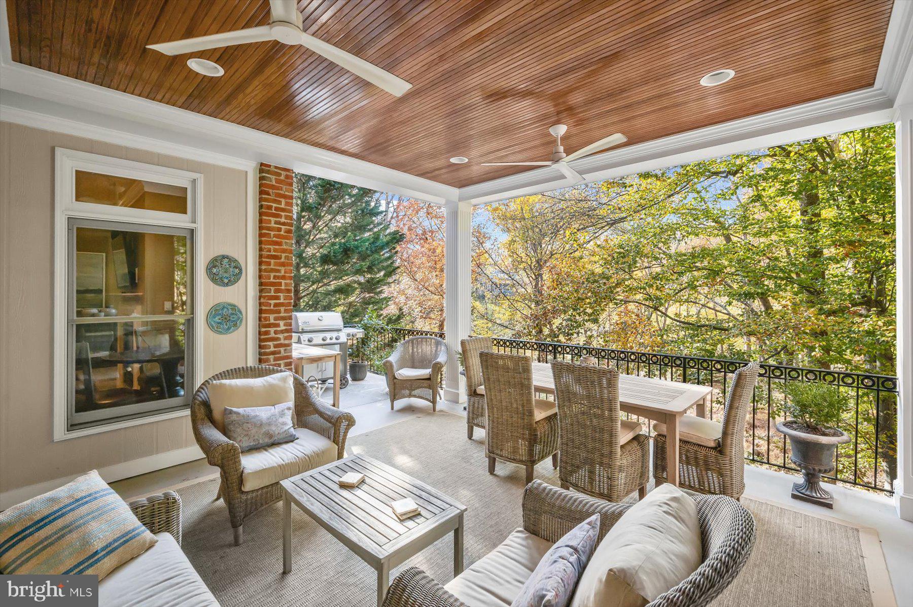 7828 Stable Way Potomac, MD 20854 - Photo 19 of 60 a outdoor living space with furniture and garden view