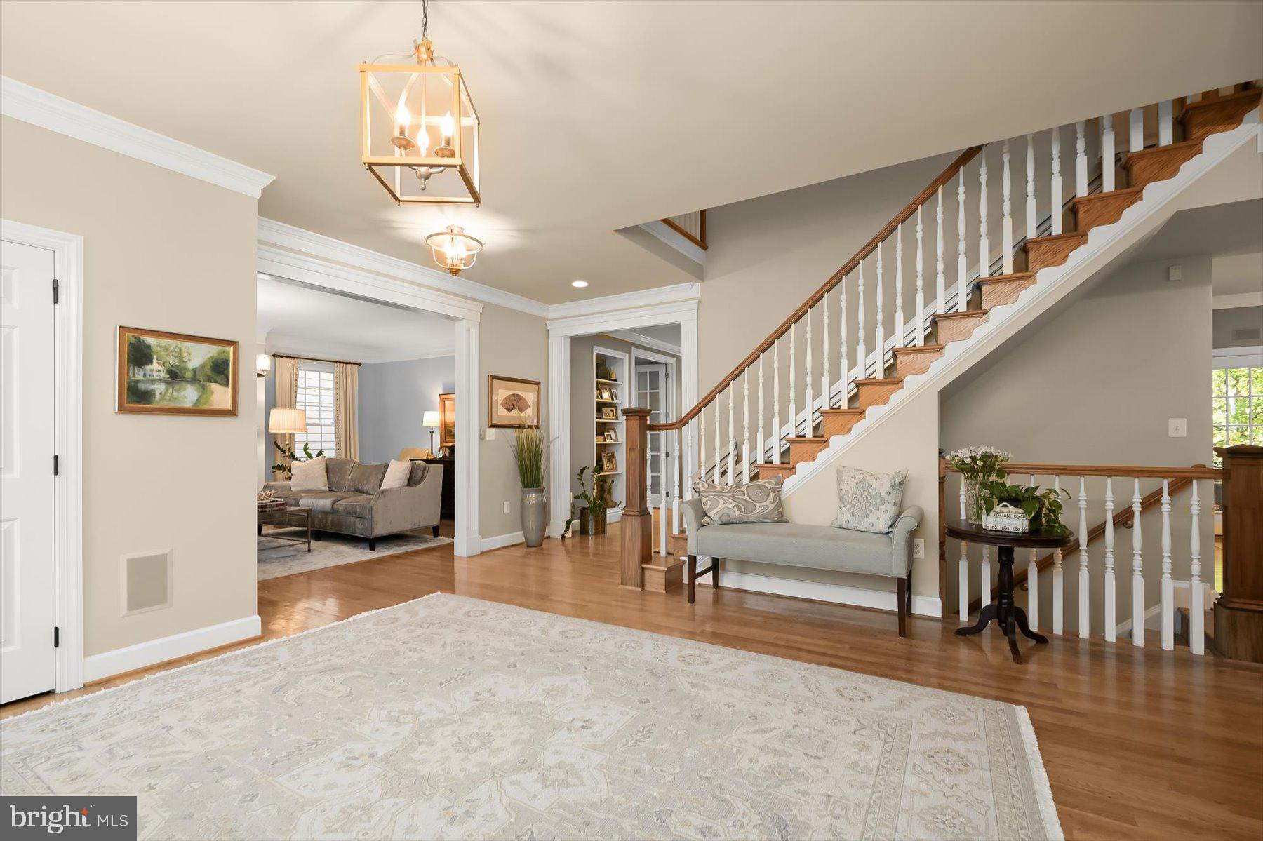 7828 Stable Way Potomac, MD 20854 - Photo 2 of 60 a view of entryway and hall with wooden floor