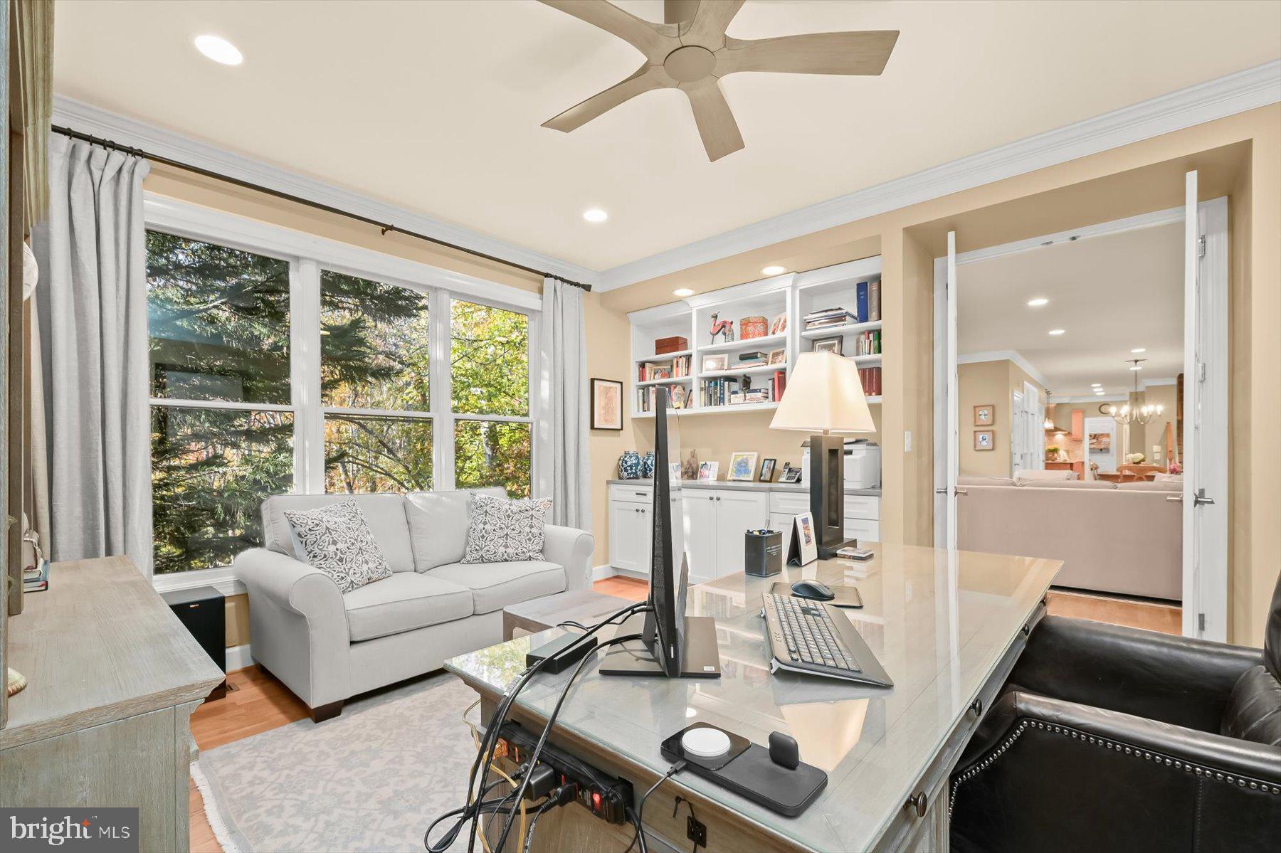 7828 Stable Way Potomac, MD 20854 - Photo 25 of 60 a living room with furniture and a large window