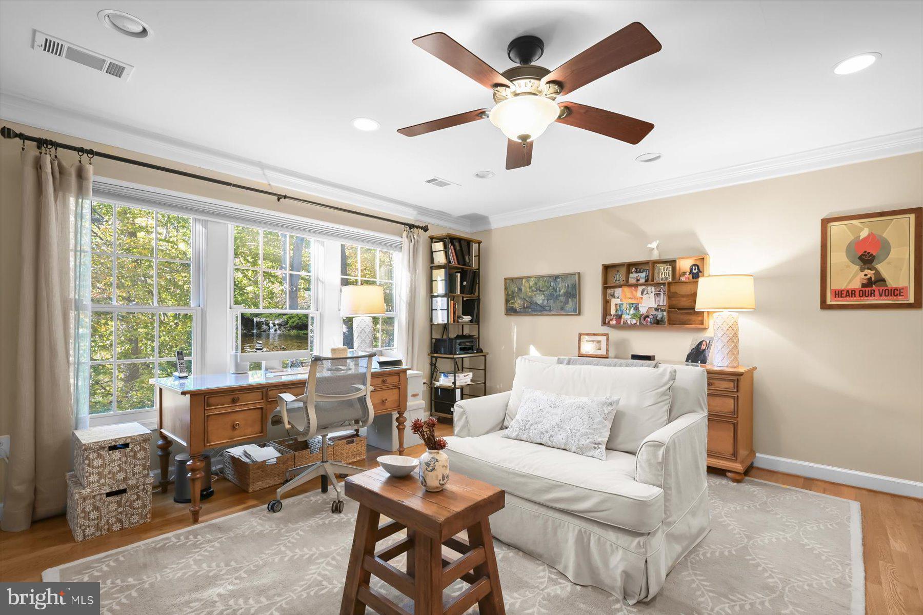 7828 Stable Way Potomac, MD 20854 - Photo 39 of 60 a living room with furniture and a large window